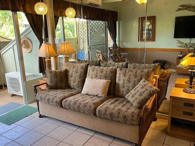 tiled living room with a healthy amount of sunlight