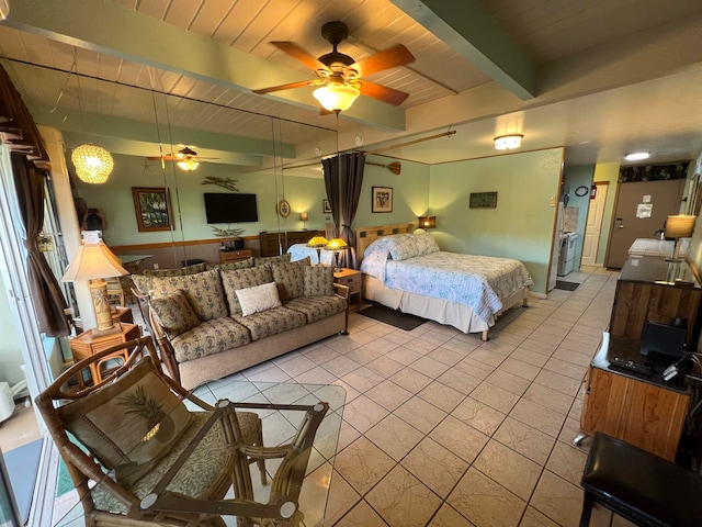 bedroom featuring wooden ceiling, light tile patterned floors, and ceiling fan