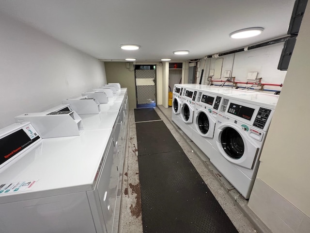 laundry room featuring washer and clothes dryer