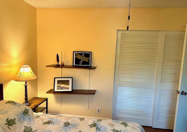 bedroom featuring a textured ceiling