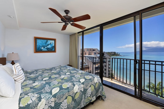 4327 Lower Honoapiilani Rd Unit 1203, Lahaina, HI 96761 - bedroom with a water view, carpet, expansive windows, and a ceiling fan