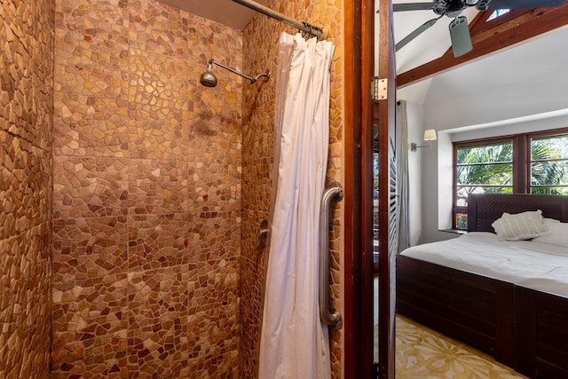 bathroom featuring a shower with curtain and ceiling fan