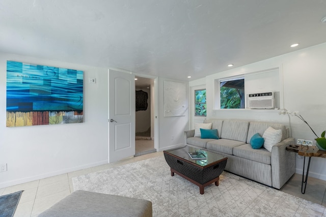 tiled living room featuring a wall unit AC