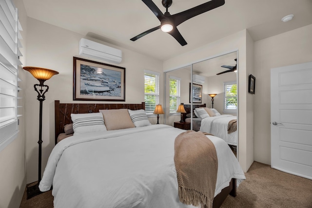 235 Kilioopu St, Wailuku, HI 96793 - carpeted bedroom featuring an AC wall unit and ceiling fan