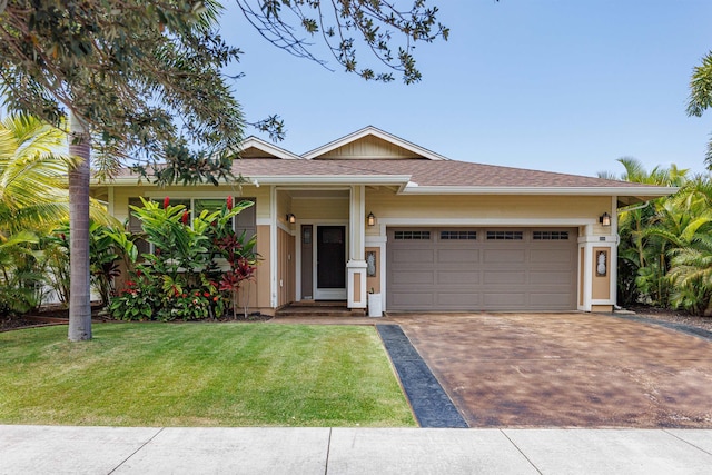 235 Kilioopu St, Wailuku, HI 96793 - single story home featuring driveway, a front yard, and a garage