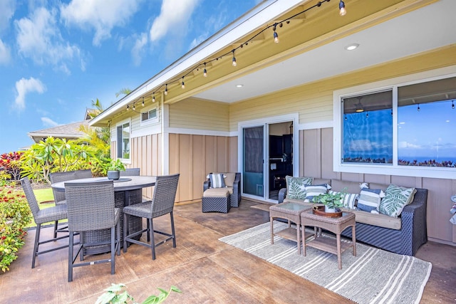 235 Kilioopu St, Wailuku, HI 96793 - view of patio featuring an outdoor living space and outdoor dining area