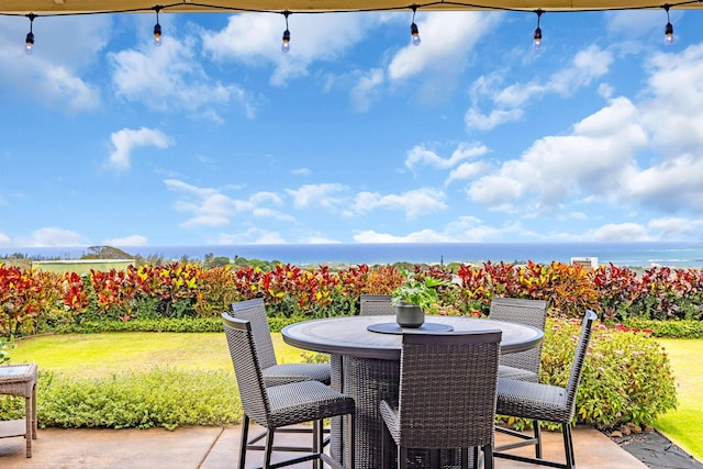 235 Kilioopu St, Wailuku, HI 96793 - view of patio with outdoor dining space and a water view