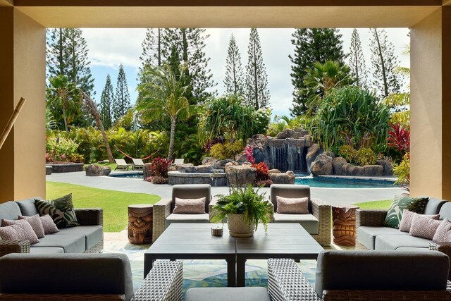 view of patio with an outdoor pool and an outdoor hangout area