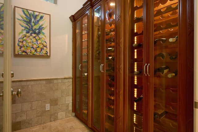 home office featuring light tile patterned flooring and ornamental molding