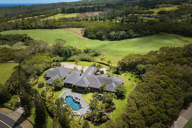 birds eye view of property with golf course view