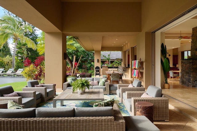 view of patio / terrace featuring ceiling fan and an outdoor hangout area