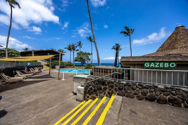 5315 Lower Honoapiilani Rd Unit D224, Lahaina, HI 96761 - view of community featuring a pool, a patio, and a water view