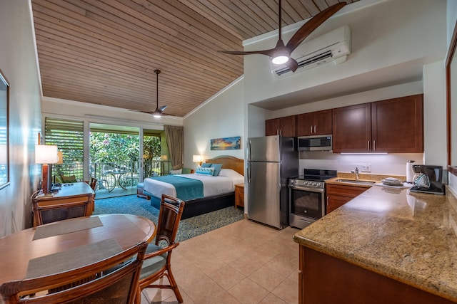 5315 Lower Honoapiilani Rd Unit D224, Lahaina, HI 96761 - kitchen featuring appliances with stainless steel finishes, wood ceiling, a ceiling fan, a wall mounted AC, and high vaulted ceiling