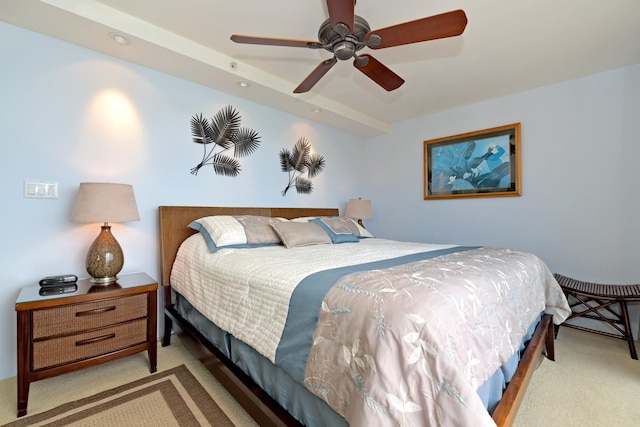 bedroom featuring light carpet and ceiling fan