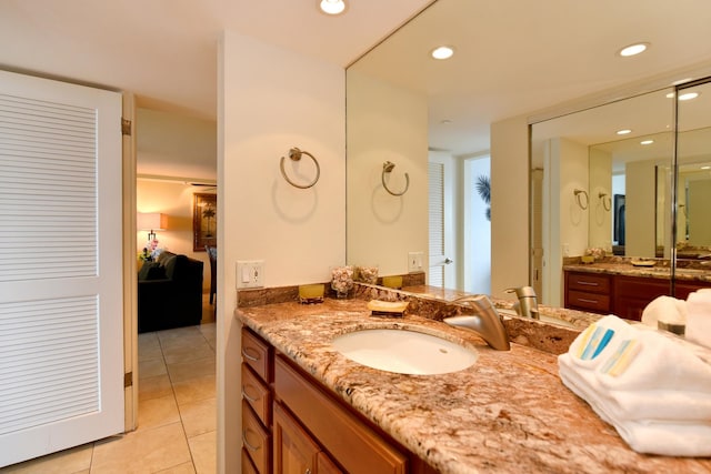 bathroom featuring vanity and tile floors