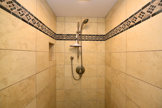 details featuring a tile shower