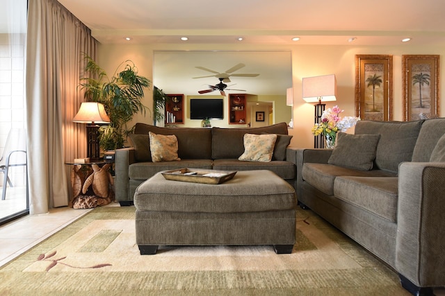 tiled living room featuring ceiling fan