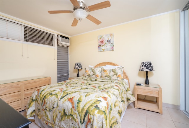 tiled bedroom featuring an AC wall unit, ornamental molding, and ceiling fan