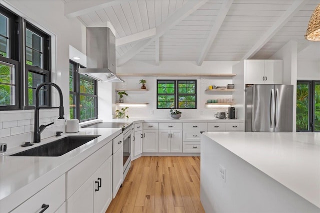 kitchen featuring open shelves, freestanding refrigerator, island range hood, electric range oven, and wood ceiling