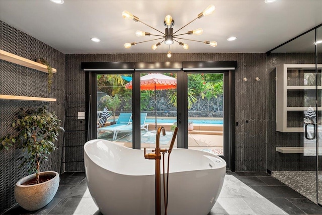 dining area featuring a chandelier and recessed lighting