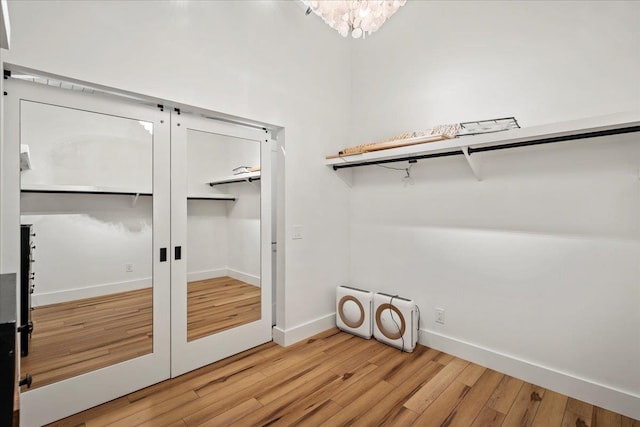 spacious closet featuring light wood finished floors