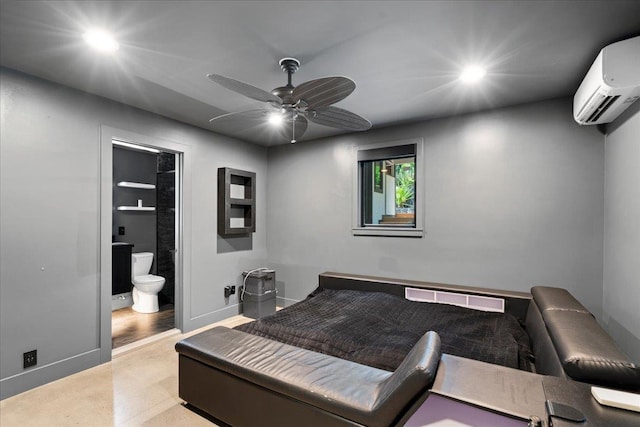 bedroom with a wall mounted AC, recessed lighting, baseboards, connected bathroom, and a ceiling fan