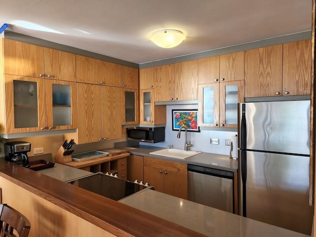 kitchen with sink and stainless steel appliances