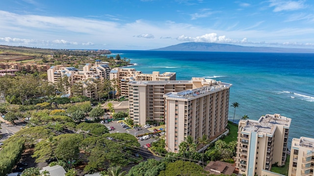 birds eye view of property featuring a water and mountain view and a city view