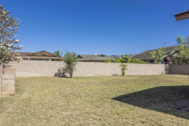 view of yard featuring a fenced backyard