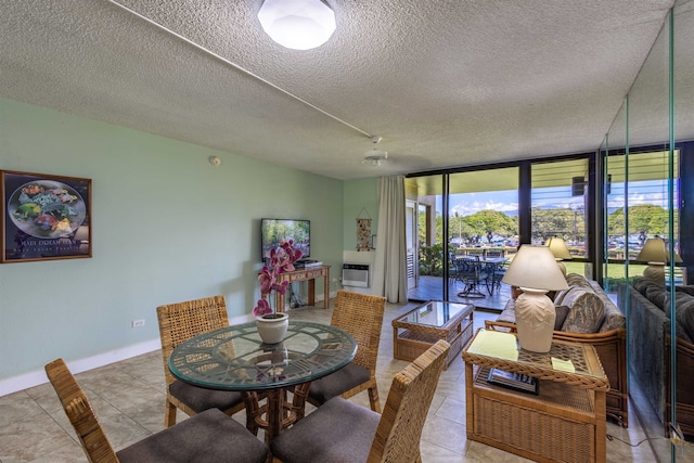 tiled dining area with expansive windows and a textured ceiling