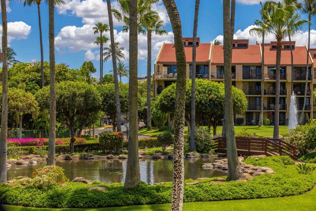 view of home's community featuring a water view