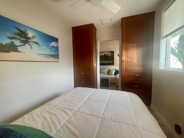 bedroom featuring baseboards and a ceiling fan