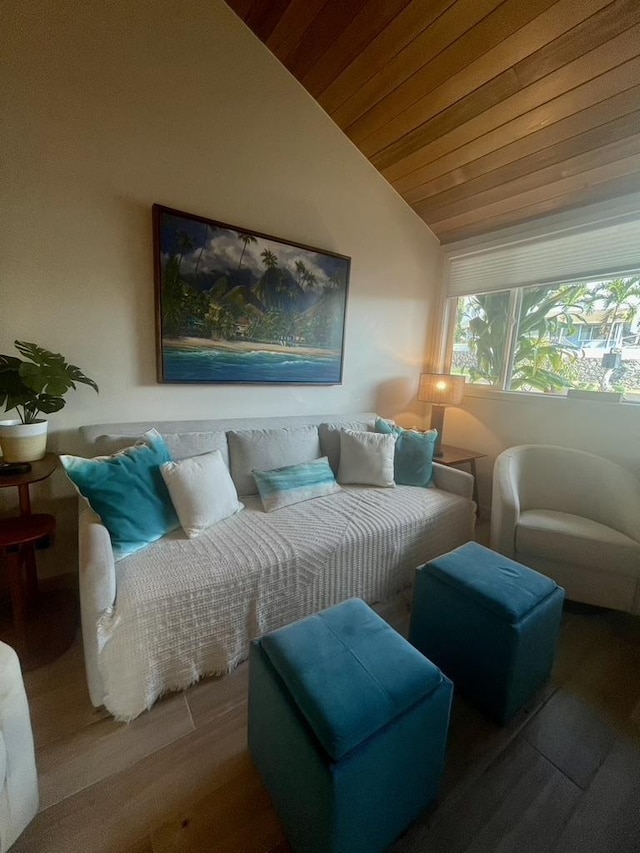 interior space featuring wooden ceiling, vaulted ceiling, and wood finished floors