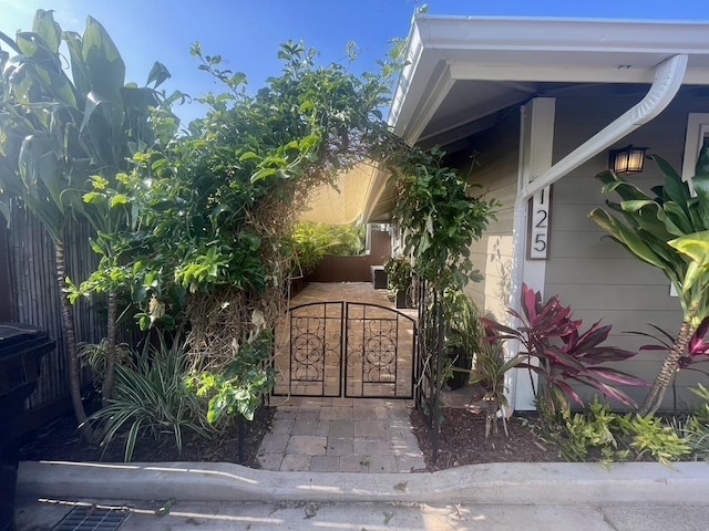 view of gate featuring fence