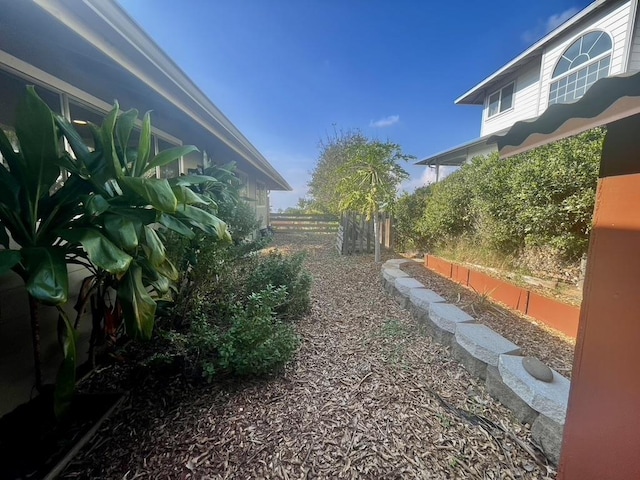 view of yard featuring fence