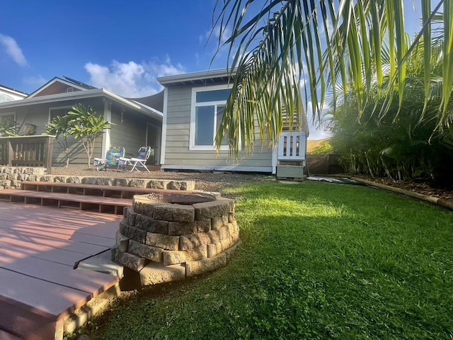 exterior space featuring a deck and a yard