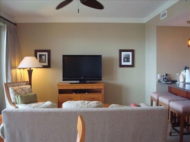 living room featuring ceiling fan