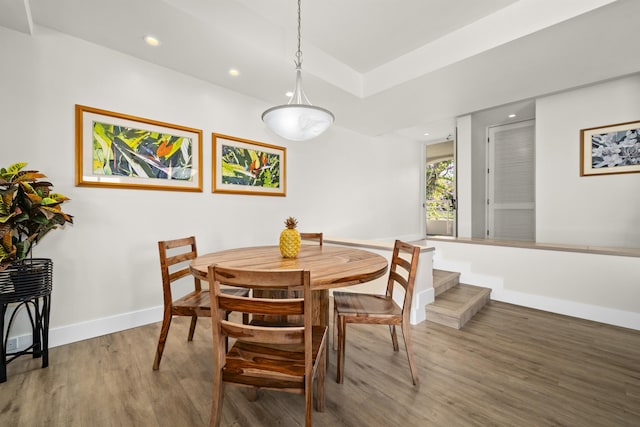 dining area featuring hardwood / wood-style floors