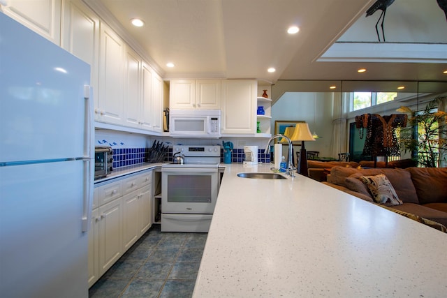 2230 S Kihei Rd Unit 9, Kihei, HI 96753 - kitchen with white appliances, white cabinetry, light countertops, recessed lighting, and open shelves