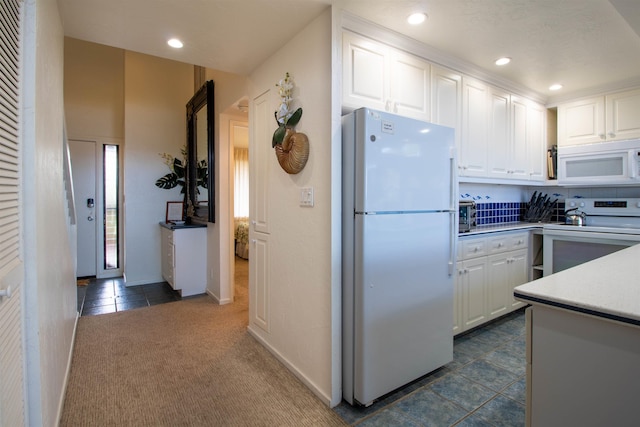 2230 S Kihei Rd Unit 9, Kihei, HI 96753 - kitchen with white appliances, white cabinetry, light countertops, dark colored carpet, and recessed lighting