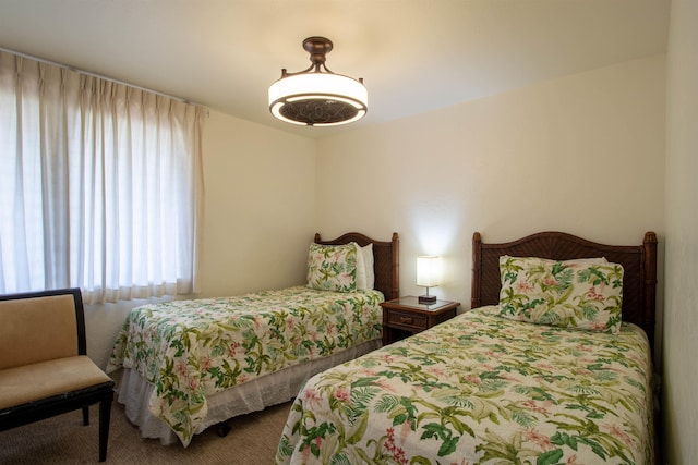 2230 S Kihei Rd Unit 9, Kihei, HI 96753 - bedroom featuring multiple windows and carpet flooring