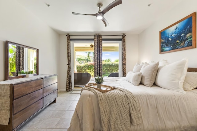 bedroom with light tile patterned flooring, ceiling fan, access to exterior, and baseboards