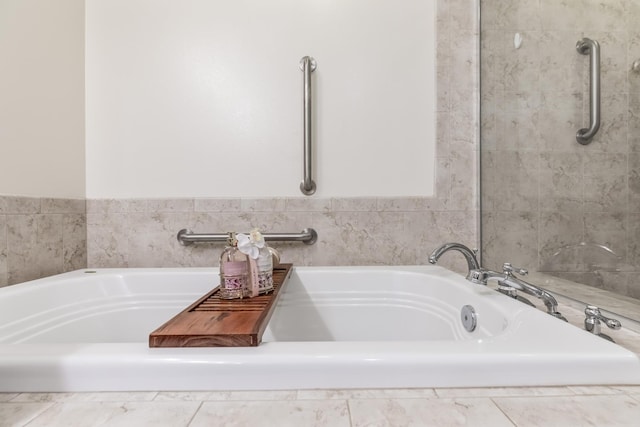 bathroom featuring a garden tub
