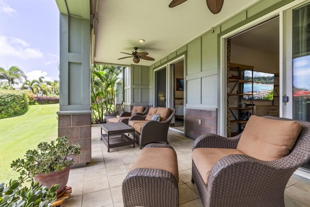 view of patio / terrace featuring a ceiling fan and outdoor lounge area