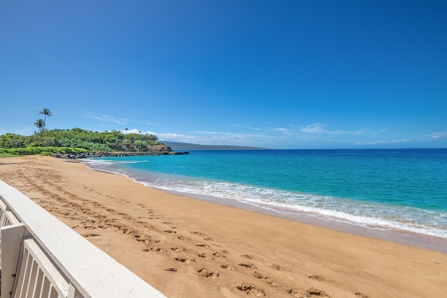 view of water feature with a beach view