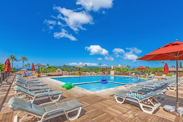 pool with a wooden deck