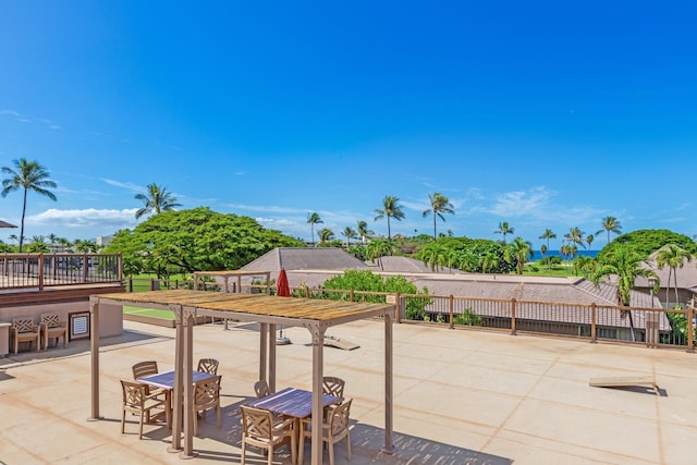 view of patio / terrace featuring fence