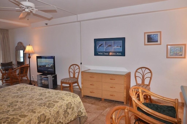 tiled bedroom with ceiling fan