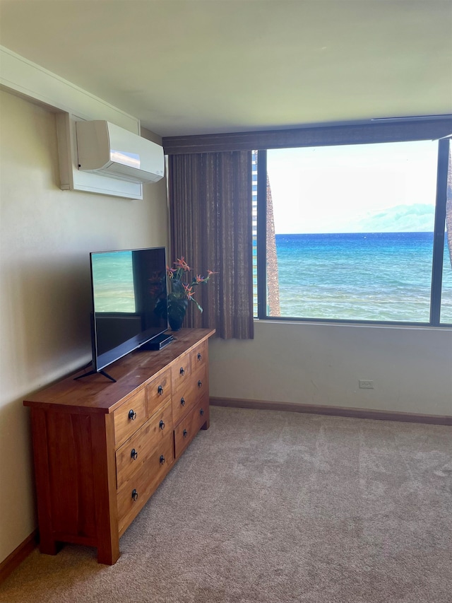 carpeted living room with a wall unit AC