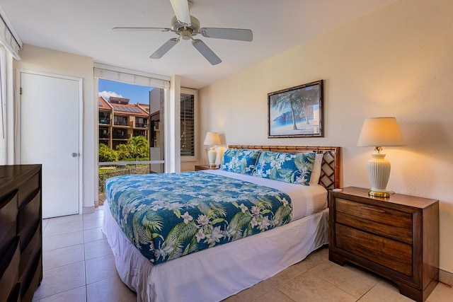 bedroom featuring light tile patterned flooring and ceiling fan